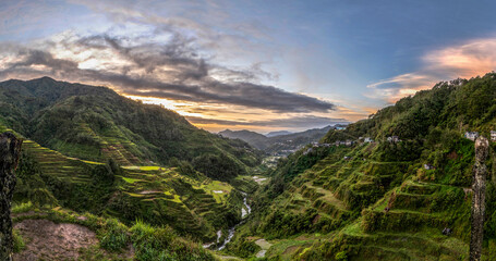 Fototapeta premium Panoramic wide angle view of the Banaue rice terraces and valley