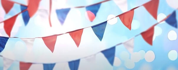 Obraz premium Festive blue and red bunting against blurry light backdrop
