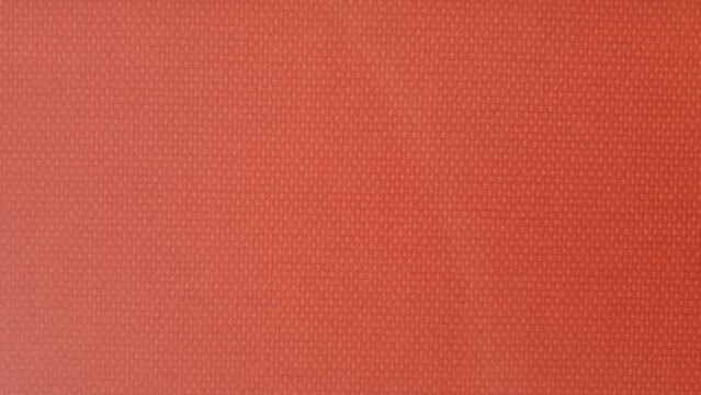 red nonwoven polypropylene fabric texture background
