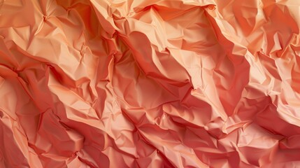 Fototapeta premium The image is of a piece of orange paper with a crumpled texture