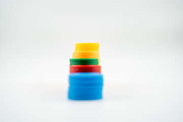 Colourful poker chips isolated over white background.