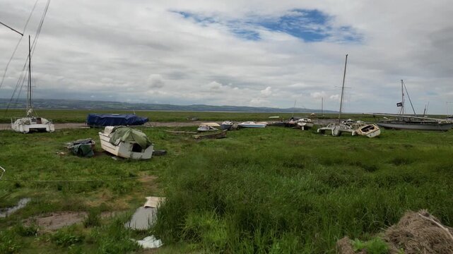 flying past stranded boats at the Wirral coastline