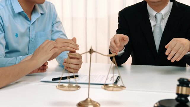 Lawyer act as mediator offer a compromise between two parties to resolve business dispute through negotiation at law firm office. Legal mediation and conflict resolution service. Slow motion. Rigid.