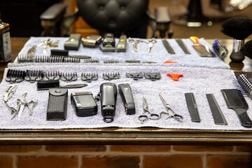 Barber tools on wooden shelf at the barber shop