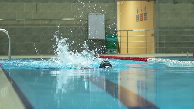 Paralympic swimmer prepares for Paris 2024 Paralympic Games. Amputee Athletes.