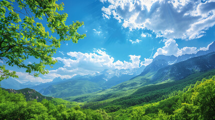 Fototapeta premium Nature's Beauty: Majestic mountain landscape with a clear blue sky and lush green forest.