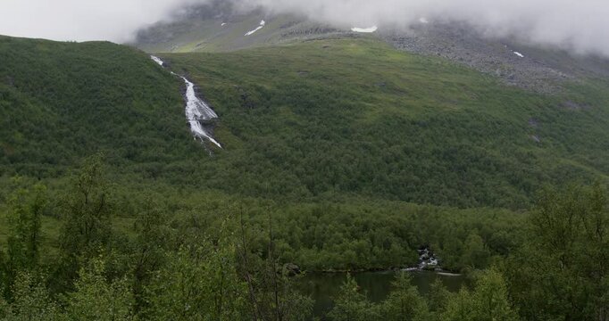 Summer in Norway. Beautiful valley Innerdalen, lake Innerdalsvatna and mountain Innerdalst&aring;rnet.