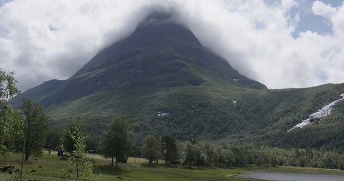 Summer in Norway. Beautiful valley Innerdalen, lake Innerdalsvatna and mountain Innerdalst&aring;rnet.