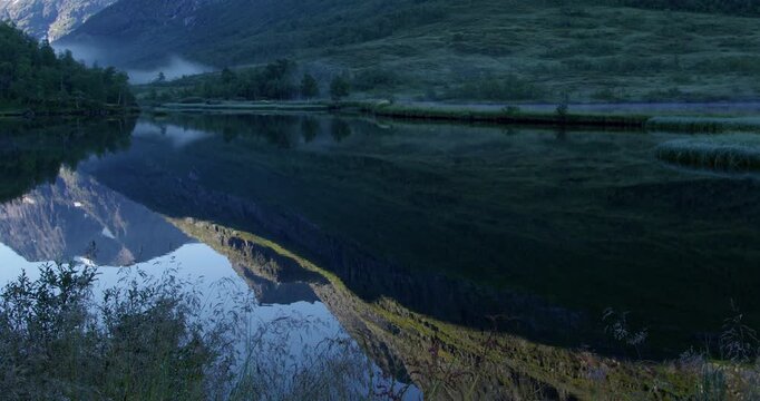 Summer in Norway. Beautiful valley Innerdalen, lake Innerdalsvatna and mountain Innerdalst&aring;rnet.
