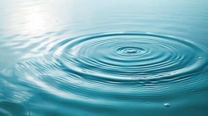A closeup of ripples expanding on a blue water surface