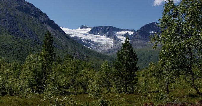 Summer in Norway. Beautiful valley Innerdalen, lake Innerdalsvatna and mountain Innerdalst&aring;rnet.