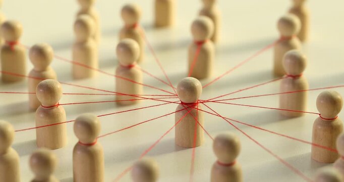 Pawns connected by red thread embody concept of membership