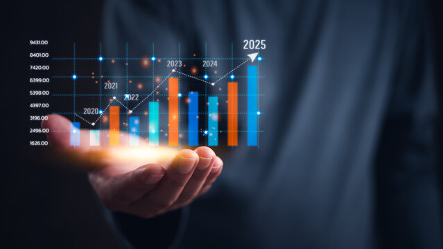 Hand holding a glowing bar chart projecting growth up to 2025. Financial growth, business success, future projections. Trend analysis, market forecasting, corporate strategy.