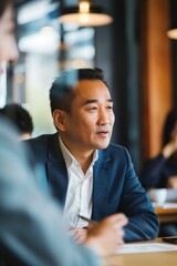 Fototapeta premium Portrait of an Asian CEO during a meeting, Generative AI
