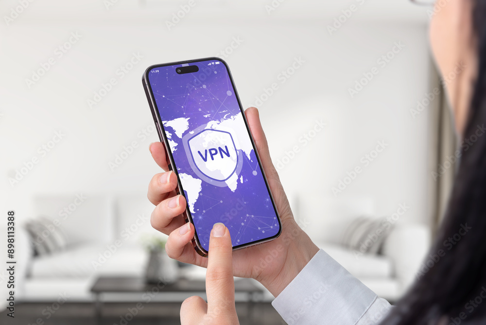 Poster woman holding a smartphone with a vpn connection, showing a world map on the screen. emphasizes glob