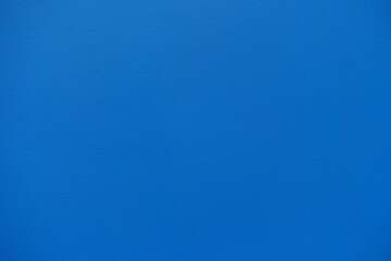 Naklejka premium Background - bright electric blue painted wall texture