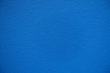 Close shot of bright electric blue painted wall