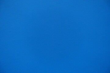 Naklejka premium Close view of bright electric blue painted wall