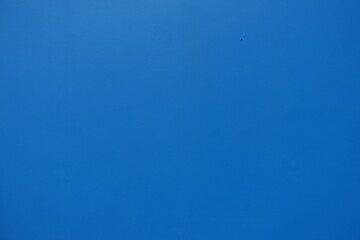 Surface of bright electric blue painted wall