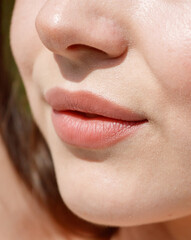 Close-up of lips on a girl's face. Macro