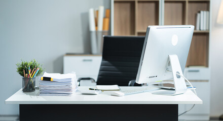 Work place concept : Mock up Blank screen computer desktop with keyboard in co-working background.