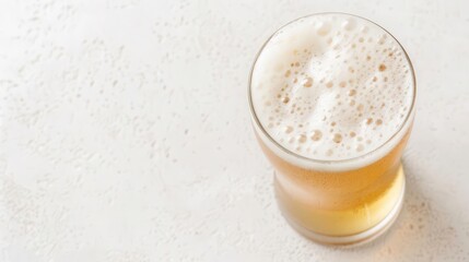 Effervescent chilled beer with hops, overhead perspective, frothy suds, clear and crisp, highlighting the refreshing chill