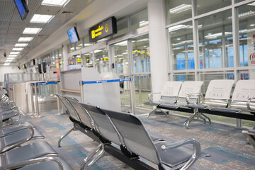 business concept with chair and advertise display board in airport