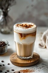 Coffee latte in a glass on a light background