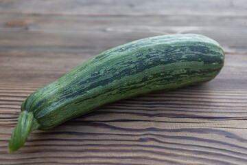 Zucchini on a wooden background Food Horizontal Background.