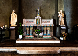 An altar inside the Roman Catholic church of Saint-Jean de Montmartre, in place des Abbesses,...