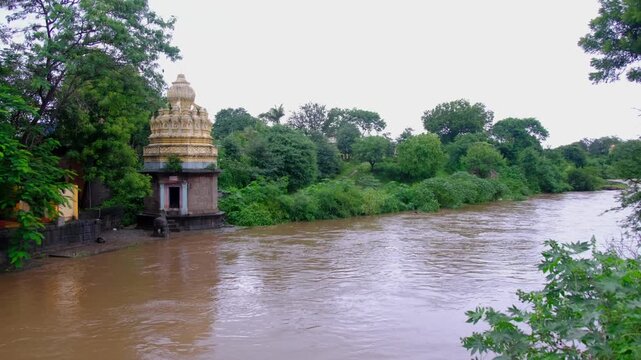 26 July 2024, Saswad, India, Sangameshwar (Lord Shiva) Temple in Rainy Season, built in the 1720s, The temple is located on the banks of the Karha and Bhogwati rivers.