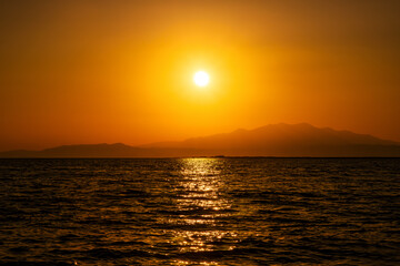 Obraz premium Golden Skies,Sunrise and Sunset Reflections on Water