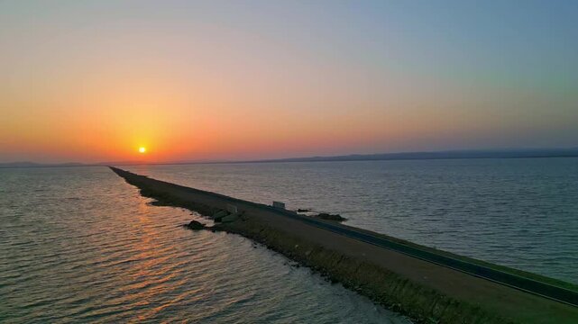 Aerial view of sunset and clear sky with calm water at Road to Heavens Kutch Gujrat India 4K