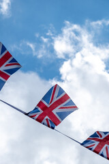 union jack flag bunting with blue sky 