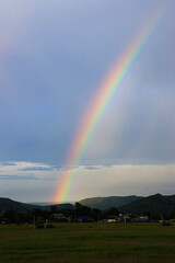 Rainbow. Bright rainbow after the rain.