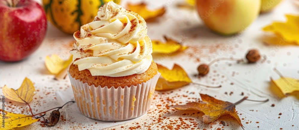 Poster a broken homemade apple cupcake with apple filling on a light background with yellow leaves evokes t