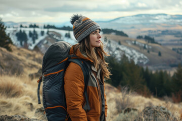 Naklejka premium Hiker embraces wanderlust wearing stylish coat on rugged trek