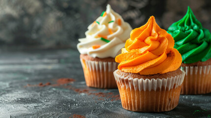 Tiranga cupcakes or tri-colour cupcakes with icing in the colours of the Indian national flag.Independence Day in India.Space for text.