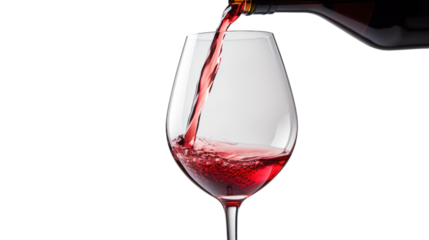 Pouring red wine into glass isolated on white background.