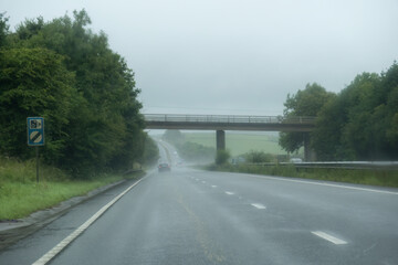 Naklejka premium A30 road in the pouring rain cornwall uk 