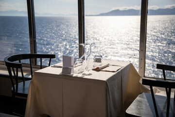restaurant table and the sea in the background