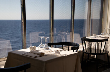 restaurant table and the sea in the background