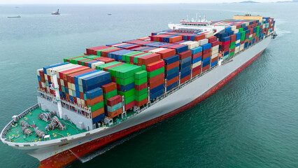 Front of Cargo container ship carrying container and running in international container port customs shipyard sea port concept smart logistic service. Container Ship..