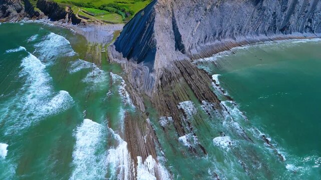 Rising tide on the Sakoneta Flysch. Aerial view from a drone on the Cantabrian Coast in Deva. Cantabrian Sea. Gipuzkoa Province. Basque Country. Spain. Europe