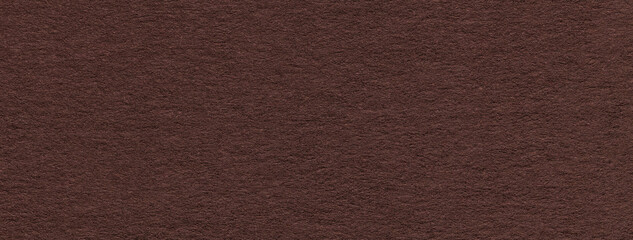 Fototapeta premium Texture of craft brown paper background colors, macro. Structure of vintage kraft umber cardboard