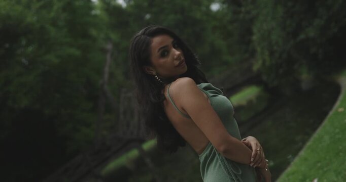 Portrait of a young woman in a park
