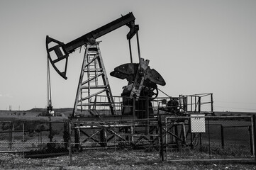 Old but still working pumpjack for oil extraction