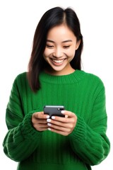 Smiling woman using smartphone