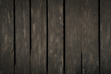 Old dark brown wooden background. Timber board tetxure
