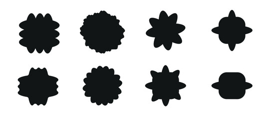 A set of shapeless black spots isolated on a white background. Flat vector illustration